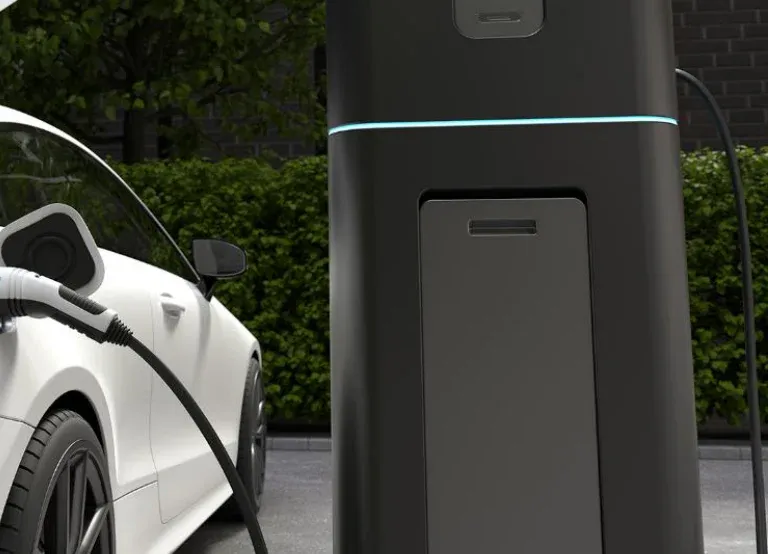 Electric car connected to a charging point. Illustrative image from the developer's catalogue, not the building itself