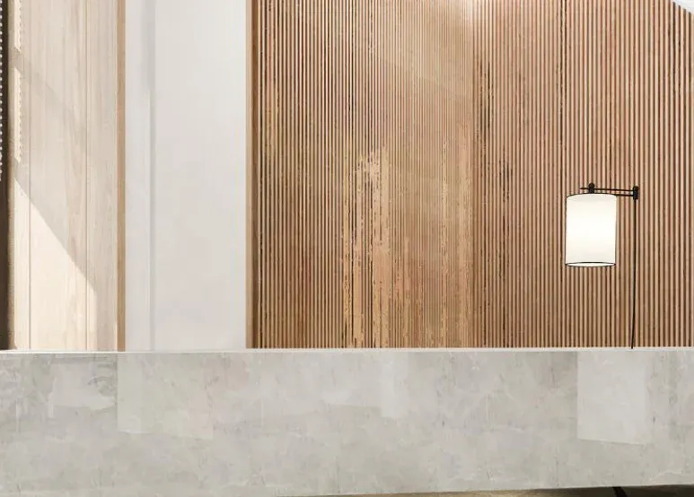 Reception desk against a timber slat wall. Illustrative image from the developer's catalogue, not the building itself