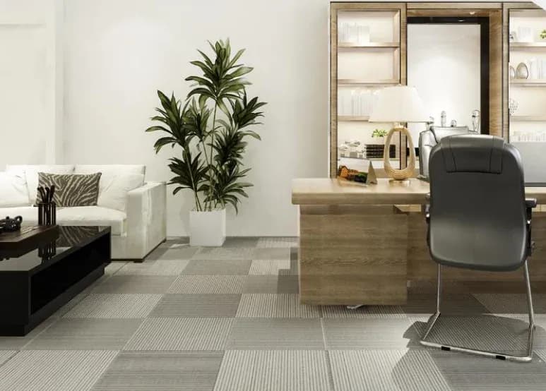 Executive office with a desk and lounge seating. Illustrative image from the developer's catalogue, not the building itself